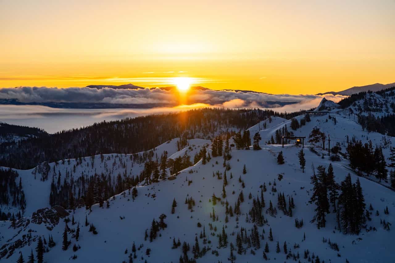 stunning sunrise over palisades tahoe bringing in new snow