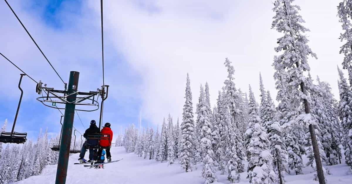 Skiers on a chairlift at Montana Snowbowl | Photo: Montana Snowbowl Facebook