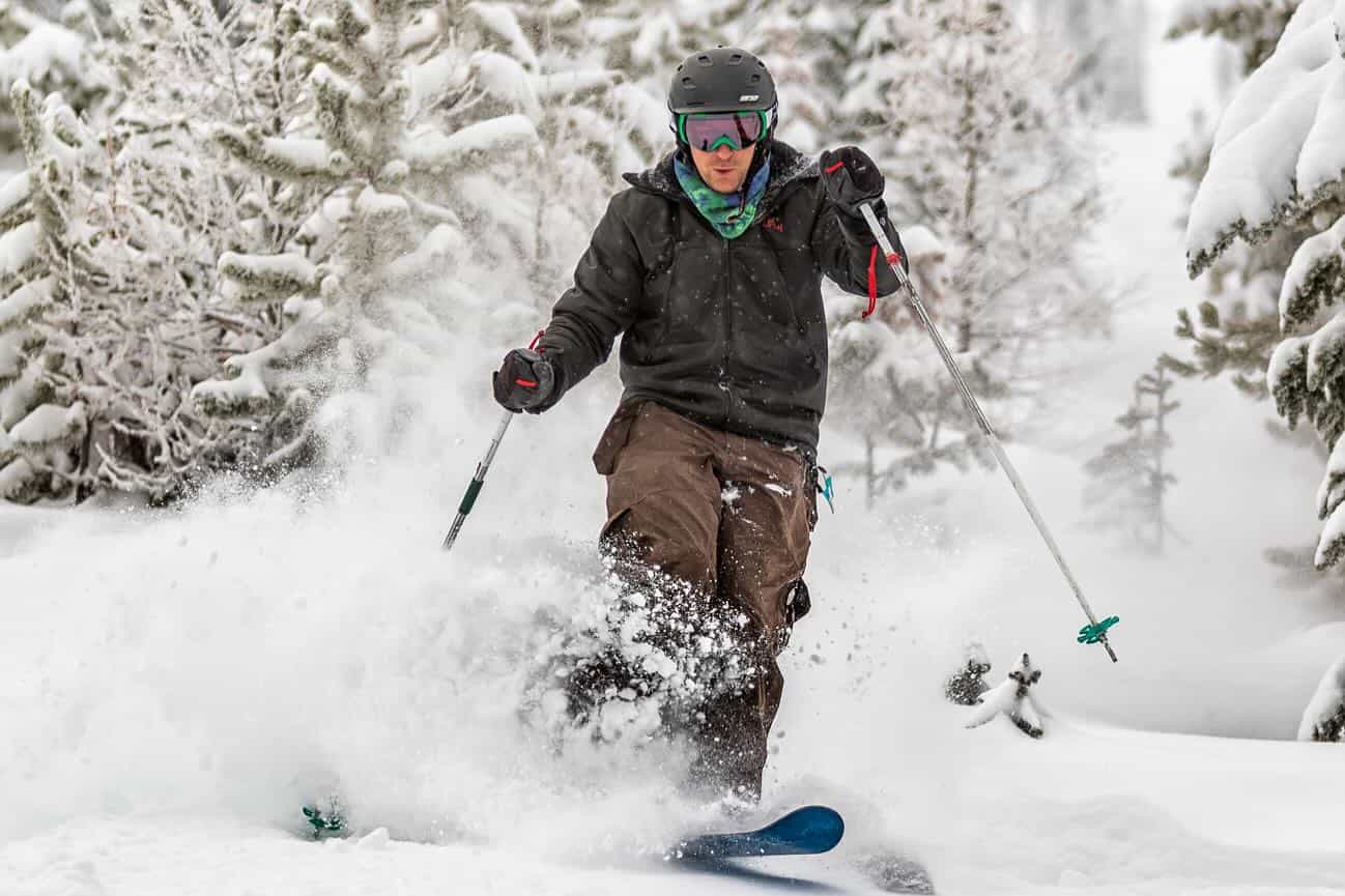 skier making turns in deep snow at blacktail mountain in montana