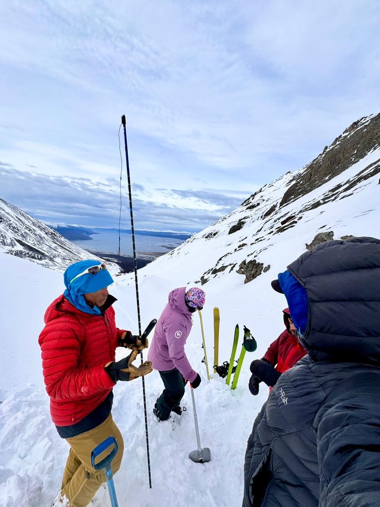 chago teaching students about avalanche rescue