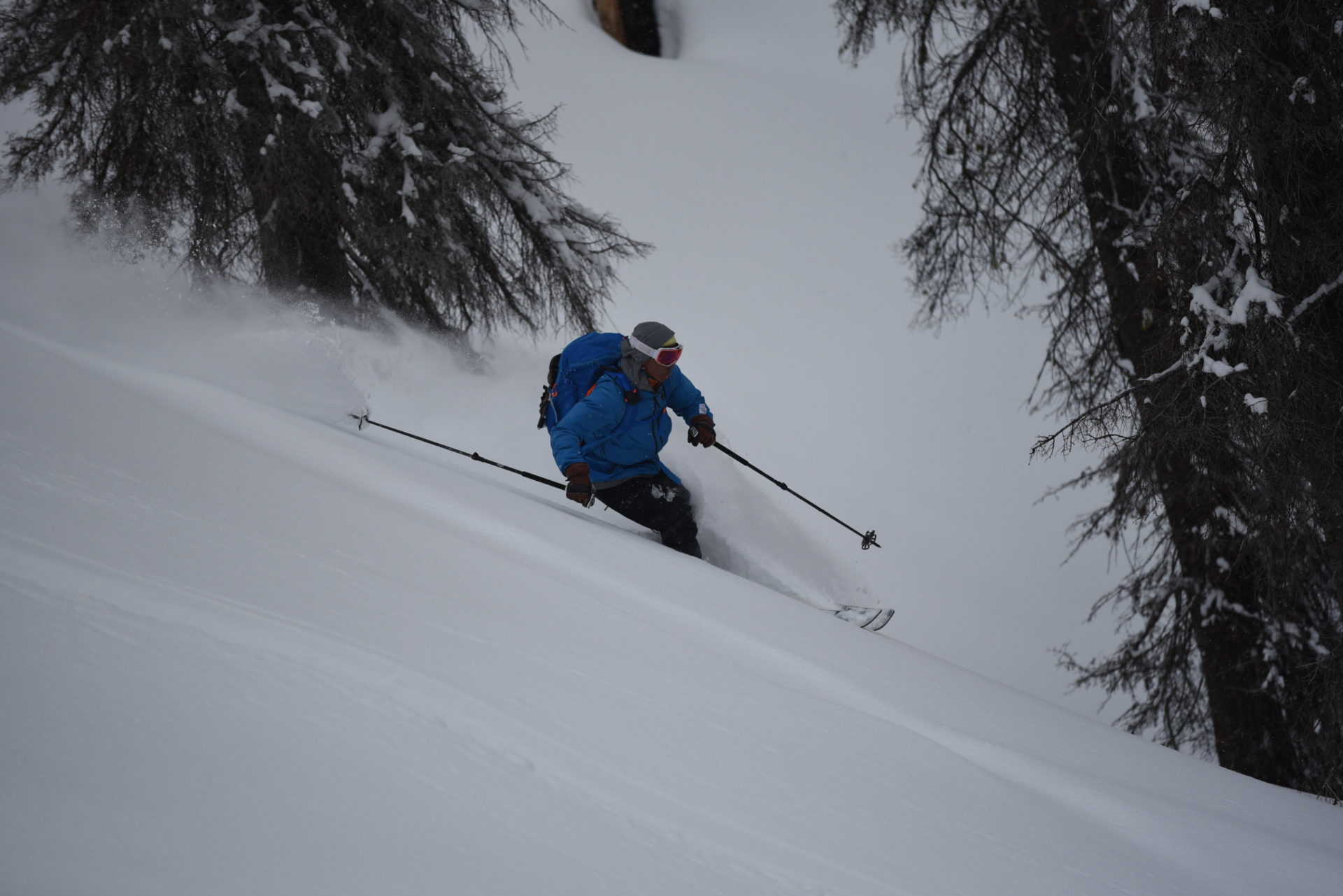 chago skiing in steep and deep pow