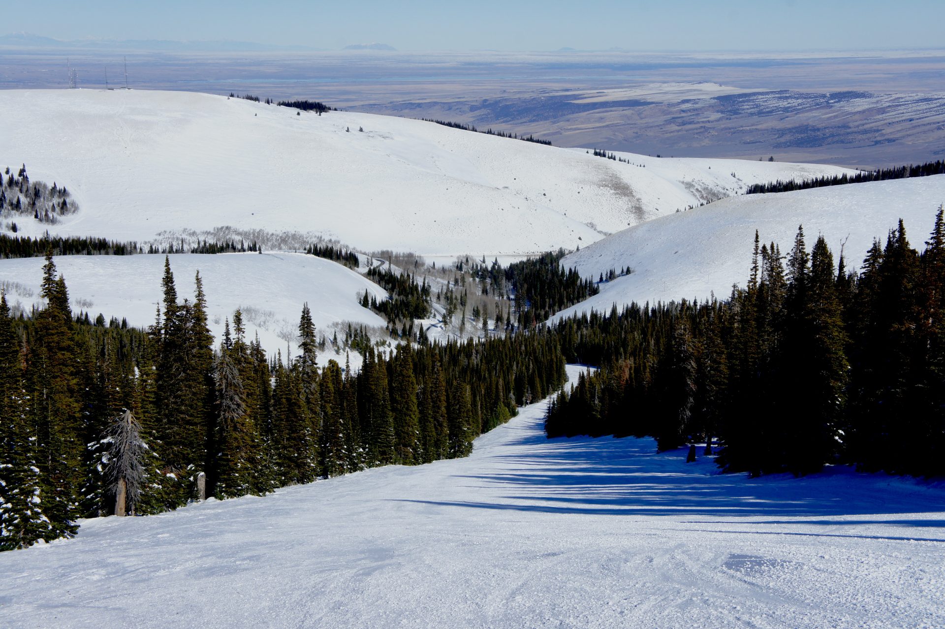 view down groomed ski run at pomerelle